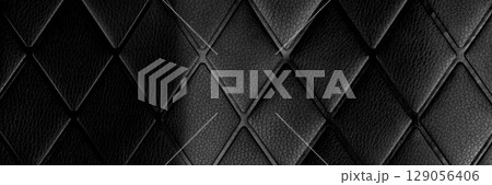 Black rhombic crumpled leather. Dark abstract surface with geometric pattern. Textured background Black rhombic crumpled leather. Dark abstract surface with geometric pattern. Textured background 129056406