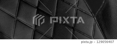 Vintage rhombic pattern black leather. Abstract dark background Vintage rhombic pattern black leather. Abstract dark background 129056407