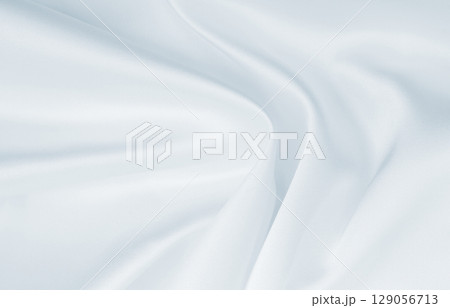 Smooth elegant grey silk or satin luxury cloth as wedding background. Luxurious background design 129056713