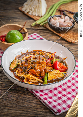 The Tam Hoi Dong or Spicy Papaya Salad with Pickled Mussels  for Thai food and cooking concept    129057319
