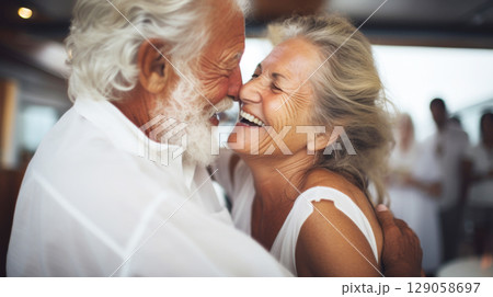 Caucasian elderly couple embracing joyfully, highlighting affection, love and happiness, St Valentines Day concept 129058697