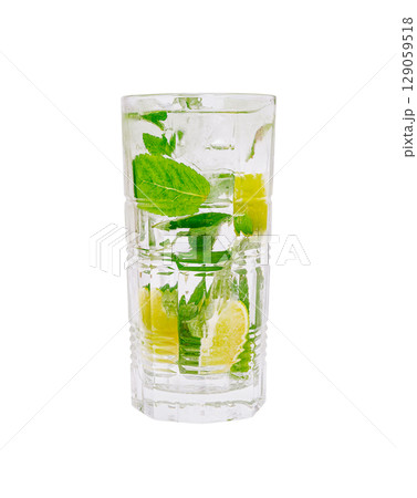 Refreshing lime and mint drink served in a glass on a warm day 129059518