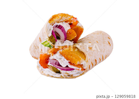 Delicious wraps filled with fresh vegetables and crispy elements at a food stall Delicious wraps filled with fresh vegetables and crispy elements at a food stall 129059818