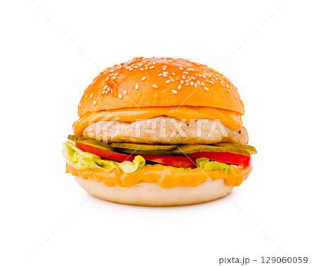 Juicy chicken burger with cheese and fresh toppings on a sesame bun 129060059