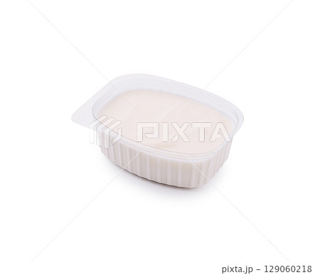 Creamy dessert in container ready to serve at party or gathering Creamy dessert in container ready to serve at party or gathering 129060218