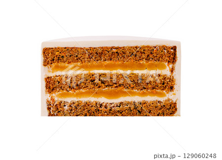 Layers of carrot cake with cream cheese frosting and caramel drizzle Layers of carrot cake with cream cheese frosting and caramel drizzle 129060248