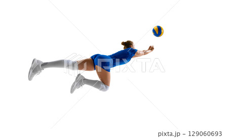 Female volleyball player diving to save ball against white background Female volleyball player diving to save ball against white background 129060693