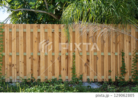 Privacy fence surrounding private property grounds for backyard protection in southern Florida 129062805