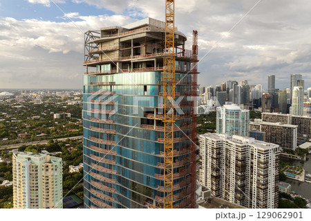 Miami, Florida. New construction site of developing residence in American urban area. Concept of housing growth in the USA 129062901