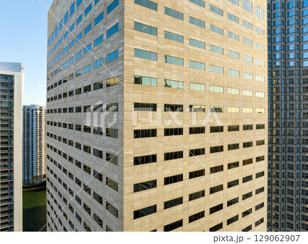 Miami downtown office district in Florida, USA at sunset. High commercial and residential skyscraper buildings in modern American city 129062907