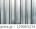 Background metal sheet with vertical lines texture 129063234