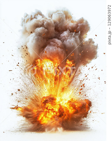 A powerful and dramatic explosion erupts with brilliant orange flames and dark smoke, scattering debris against a stark white background. 129063972