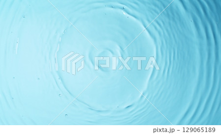 Blue Water drop falling, macro splash. Natural background. Blue Water drop falling, macro splash. Natural background. 129065189