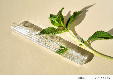 The texture of an organic cosmetic product in a test tube. 129065415