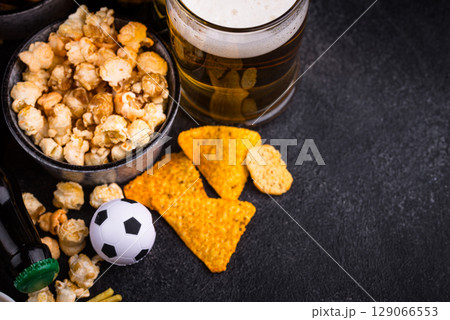 Beer and different snacks for Superbowl or football party 129066553