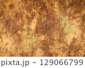 Brown wrinkled fabric texture with subtle green stains, abstract background for design, vintage or grunge style 129066799