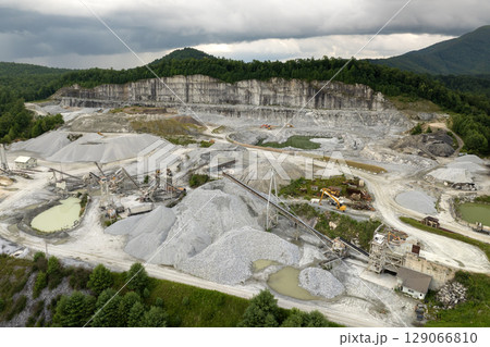 Limestone quarry at industrial open-pit mining site In North Carolina Appalachians, USA Limestone quarry at industrial open-pit mining site In North Carolina Appalachians, USA 129066810