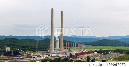 Coal-fired power plant producing electricity. Fossil fuel usage for energy production 129067073