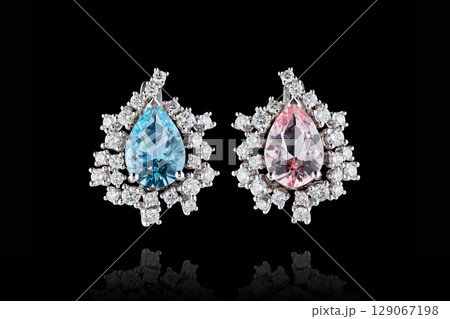 earrings silver, gold with stone aquamarine and morganite, diamonds on black background 129067198