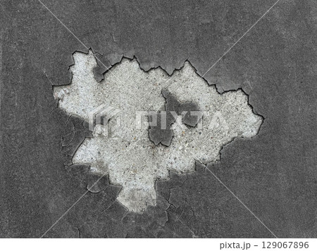 Old damaged and cracked asphalt sidewalk 129067896