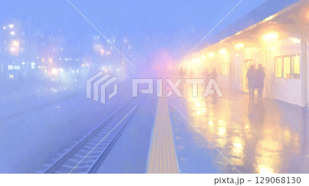 雨の郊外駅ホーム 濡れた線路とぼやけた灯り 雨の郊外駅ホーム 濡れた線路とぼやけた灯り 129068130