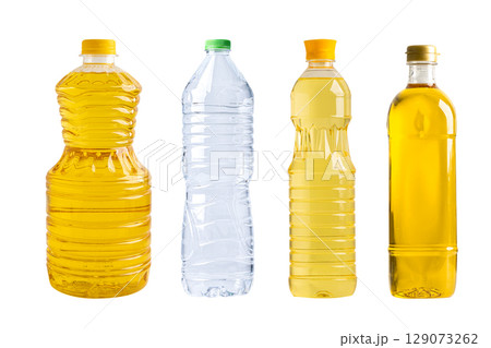 Vegetable oil and water in different bottle for cooking isolated on white background. 129073262