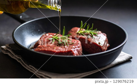 A sizzling beef steak and vibrant pan-fried vegetables create a healthy, delicious meal 129076219