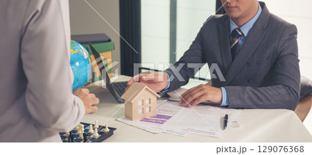 Banner Businessman real estate house agent team businessperson. Manager selling house real estate agent at office desk. Businessman working home insurance mortgage sale apartment with copy space Banner Businessman real estate house agent team businessperson. Manager selling house real estate agent at office desk. Businessman working home insurance mortgage sale apartment with copy space 129076368