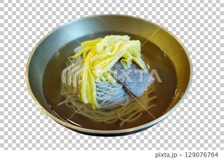 Refreshing traditional Korean cold buckwheat noodles with beef and egg strips in clear broth perfect summer dish Refreshing traditional Korean cold buckwheat noodles with beef and egg strips in clear broth perfect summer dish 129076764