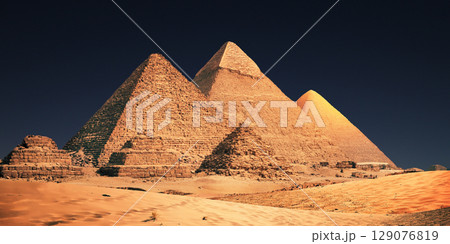 night scene of the castle pyramid in the desert 129076819
