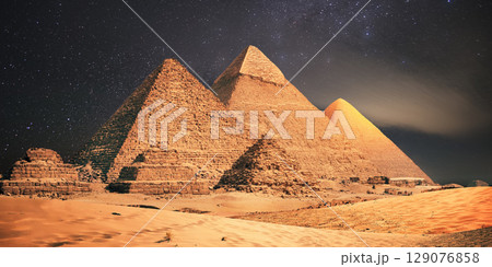 night scene of the castle pyramid in the desert night scene of the castle pyramid in the desert 129076858
