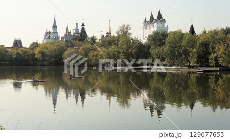 The Russian Kremlin, located on the banks of a peaceful river. 129077653
