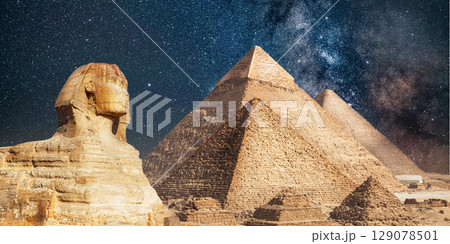 night scene of the castle pyramid in the desert 129078501