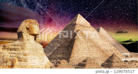 night scene of the castle pyramid in the desert 129078517