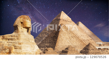 night scene of the castle pyramid in the desert 129078526