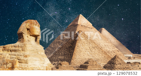 night scene of the castle pyramid in the desert 129078532