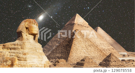 night scene of the castle pyramid in the desert 129078558
