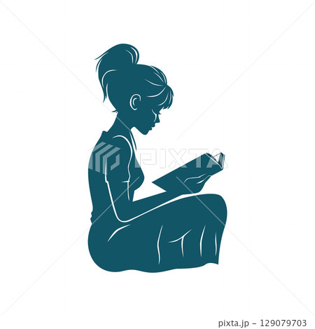 Little Girl Reading a Book by Herself 129079703