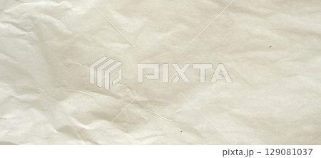 Abstract white crumpled and creased recycle paper texture background 129081037