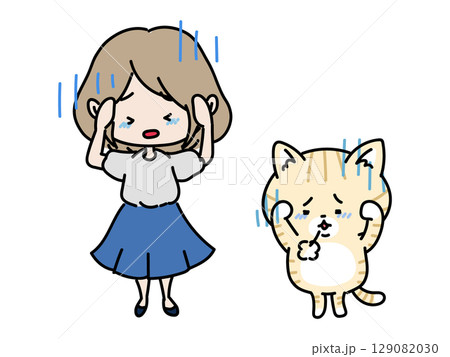 頭を抱え落ち込む女性と猫ちゃん 頭を抱え落ち込む女性と猫ちゃん 129082030