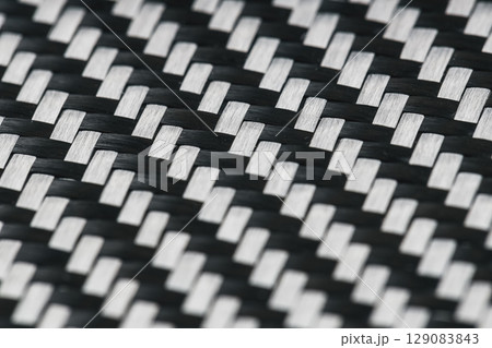 Carbon fiber glass texture close up macro Carbon fiber glass texture close up macro 129083843