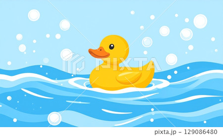 A fun, isolated yellow rubber ducky toy swims in the water, perfect for a child's bath 129086480