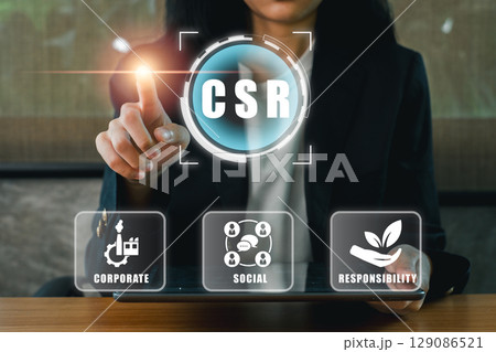 Business professional interacting with CSR icons, highlighting corporate, social, and environmental responsibility. Business professional interacting with CSR icons, highlighting corporate, social, and environmental responsibility. 129086521