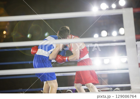 boxers fight with gloves in the ring punch hook boxers fight with gloves in the ring punch hook 129086764
