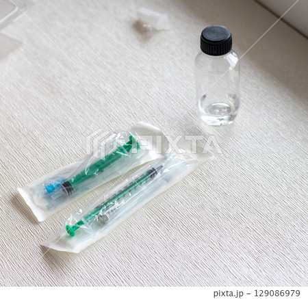 Shot of the syringes and medicine prepared for injection 129086979