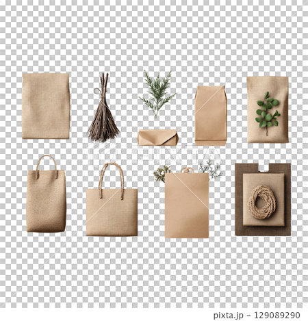 Natural kraft paper packaging and decorative elements arranged aesthetically. This collection features various sizes and styles of bags, boxes, and greenery, perfect for eco friendly gifting Natural kraft paper packaging and decorative elements arranged aesthetically. This collection features various sizes and styles of bags, boxes, and greenery, perfect for eco friendly gifting 129089290
