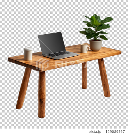 modern wooden table featuring laptop, two coffee cups, and potted plant, creating cozy workspace atmosphere. Ideal for home or office settings 129089367