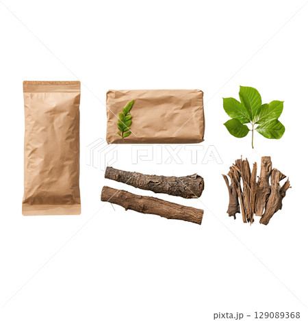 Natural materials including brown paper packaging, leaves, and wood pieces create earthy composition. Perfect for eco friendly projects or rustic decor Natural materials including brown paper packaging, leaves, and wood pieces create earthy composition. Perfect for eco friendly projects or rustic decor 129089368