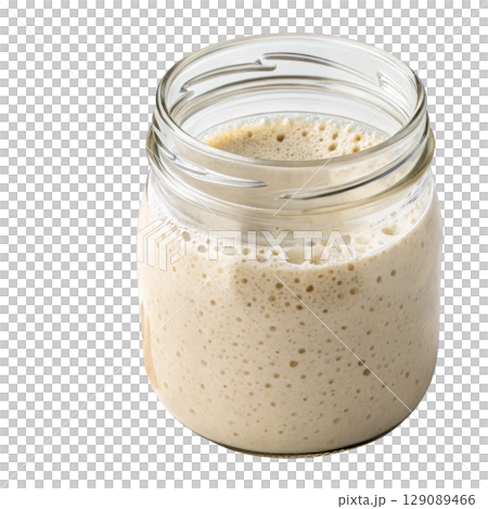 glass jar filled with bubbly sourdough starter, showcasing its active fermentation process, isolated on transparency background 129089466
