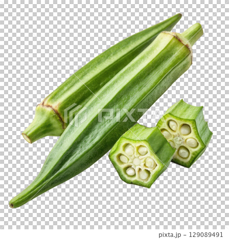Fresh green okra pods and sliced pieces on transparent background, showcasing their vibrant color and texture 129089491